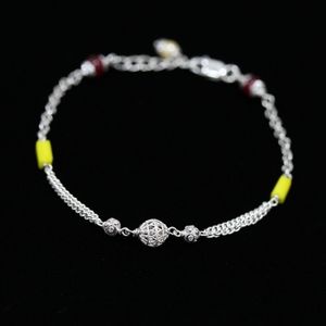 Yellow and maroon beaded chained  bracelet